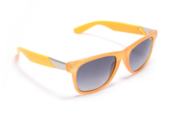 istock Sunglasses with transparent orange frame isolated on white 668751210