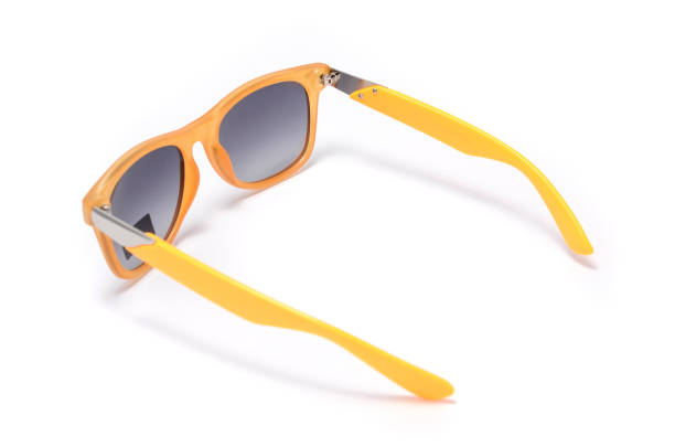 istock Sunglasses with transparent orange frame isolated on white 668751218