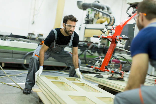 istock Male workers  in a factory 668757864