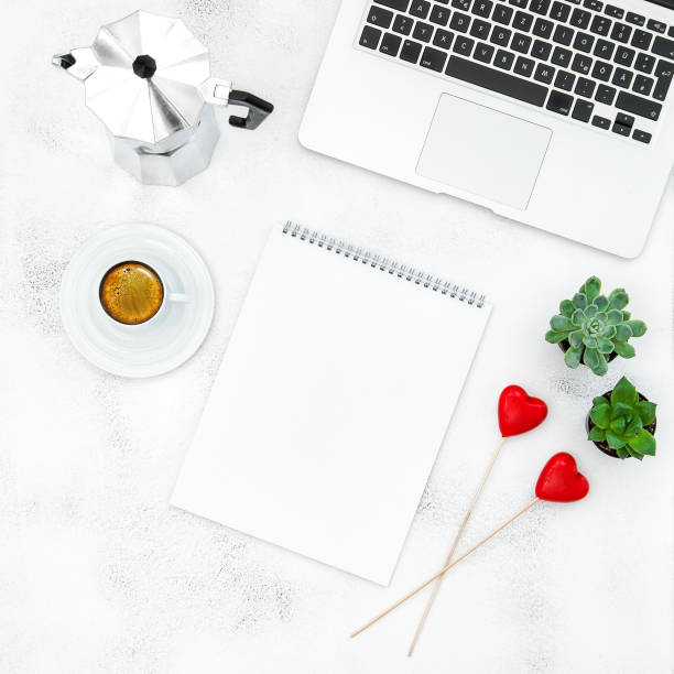 istock Coffee keyboard open book red hearts Home office workplace 668760674