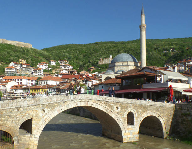 People relaxing in Prizren Old City, UNESCO world heritage site in Kosovo on 22nd April 2016 People relaxing in Prizren Old City, UNESCO world heritage site in Kosovo on a sunny day of 22nd April 2016 22nd april stock pictures, royalty-free photos & images