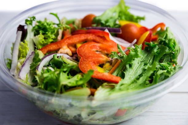 istock Healthy bowl of salad on table 668764138
