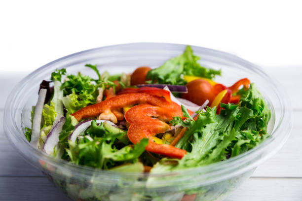 istock Healthy bowl of salad on table 668764156