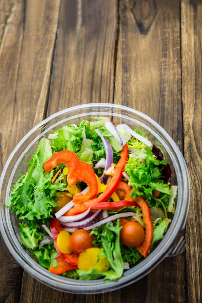 istock Healthy bowl of salad on table 668764324