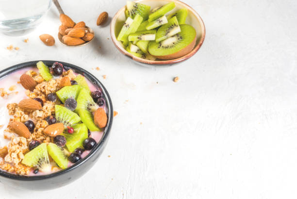 istock Smoothie bowl with fruits and nuts 668792334