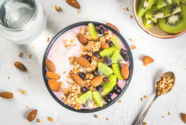 istock Smoothie bowl with fruits and nuts 668792388