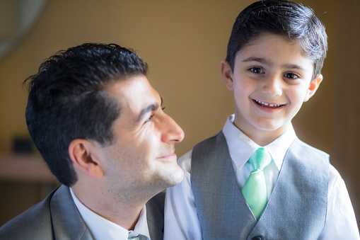 Father and son on wedding day