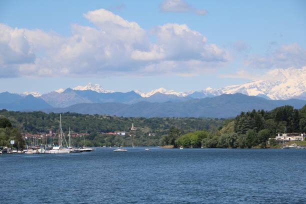 Sesto Calende and Alps panoramic view from the River Ticino, Italy
