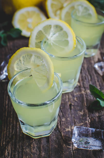 istock Italian traditional liqueur limoncello with lemon 668798240