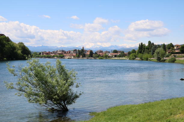 istock Sesto Calende and Alps panoramic view from the River Ticino, Italy 668802458