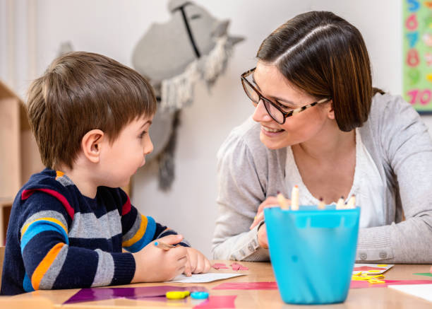 istock Mother with creative kid having fun time together 668811642