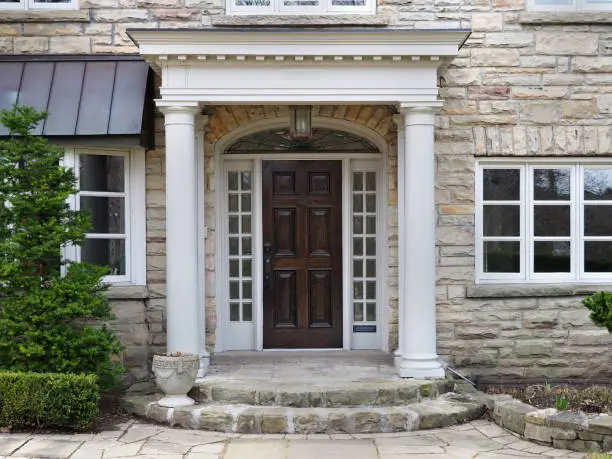 Photo of house front door with portico entrance