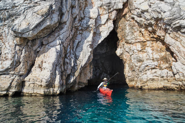 istock Sea kayak and cave 668815592
