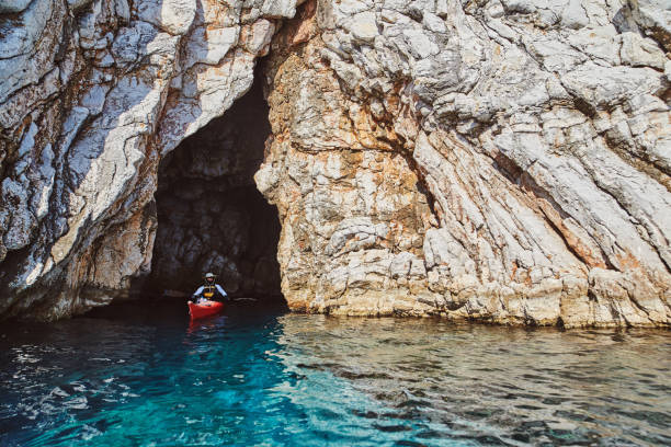istock Sea kayak and cave 668817850