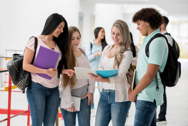 istock Happy group of students at the university 668843270