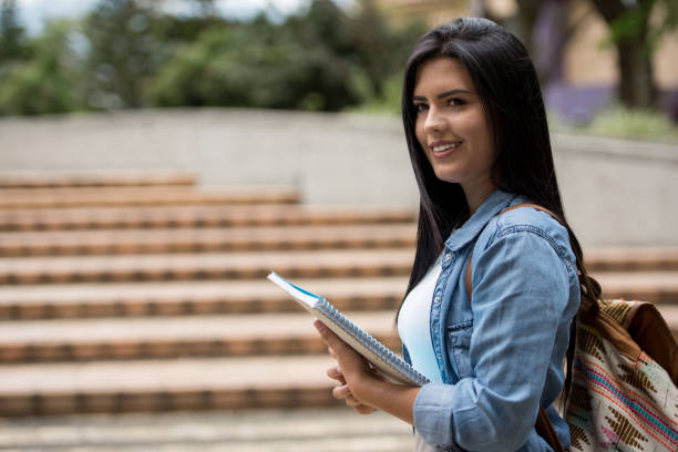 istock Beautiful female student at the university 668843320