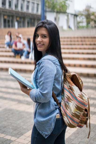 istock Beautiful female student at the university 668843368
