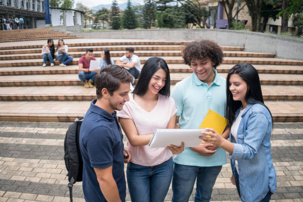 istock Happy group of students at the university 668843374