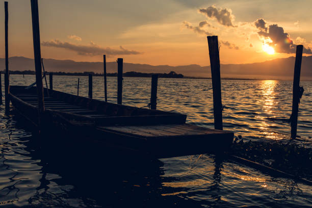 istock Silhouette boat in the lake 668843668
