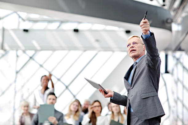 istock Speaker presenting at business seminar 668846438