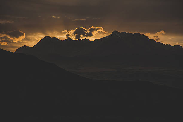 istock Scenic View Of Mountains Against Cloudy Sky 668857865
