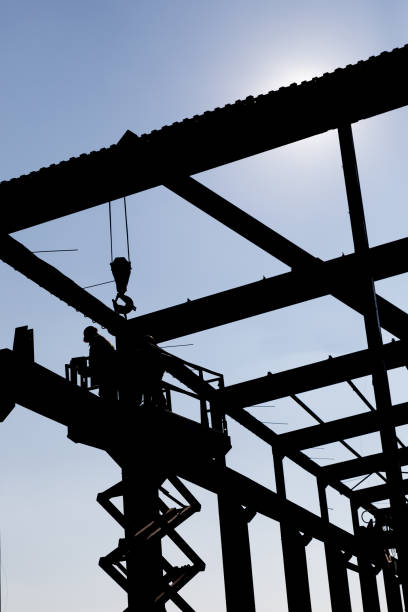 istock Silhouette of the workers dissembling 3 668876940
