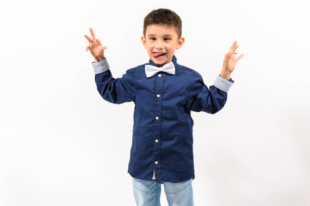 istock Studio shot of cute happy boy smiling making funny face 668881706