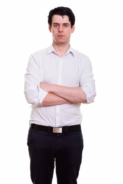 istock Studio shot of handsome businessman standing while looking at camera with arms crossed 668884182