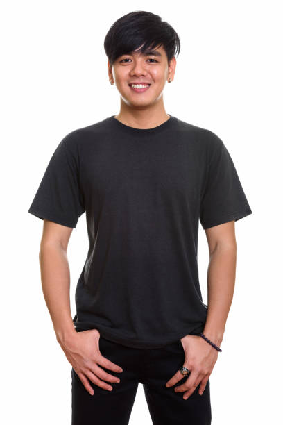 istock Studio shot of cool happy Asian man smiling and standing 668885048