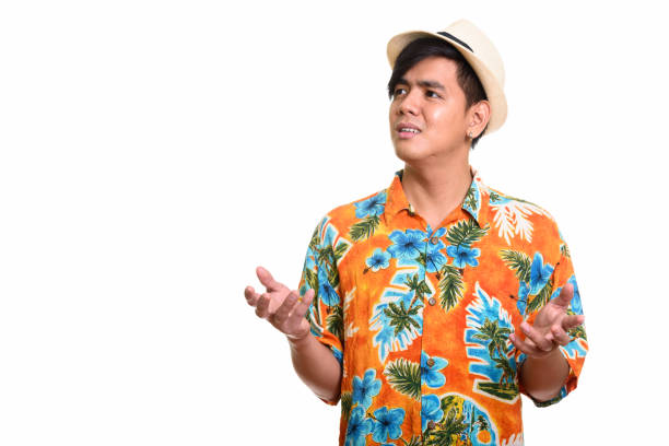 istock Studio shot of handsome Asian tourist man thinking while looking upset 668889000