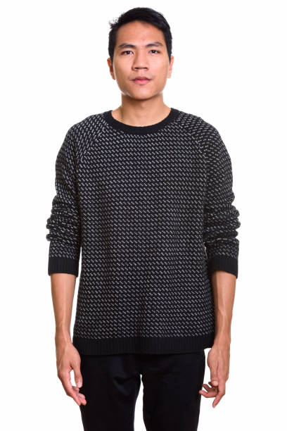 istock Studio shot of young Asian man standing 668892308