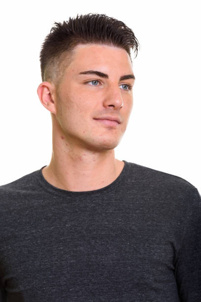istock Face of young handsome man thinking while looking away 668895548