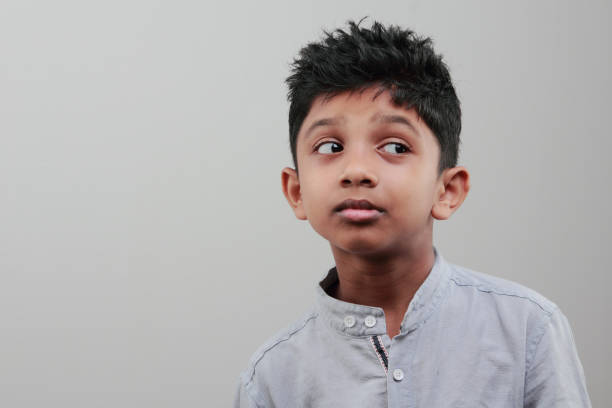 istock Portrait of a excited boy looking up 668898914