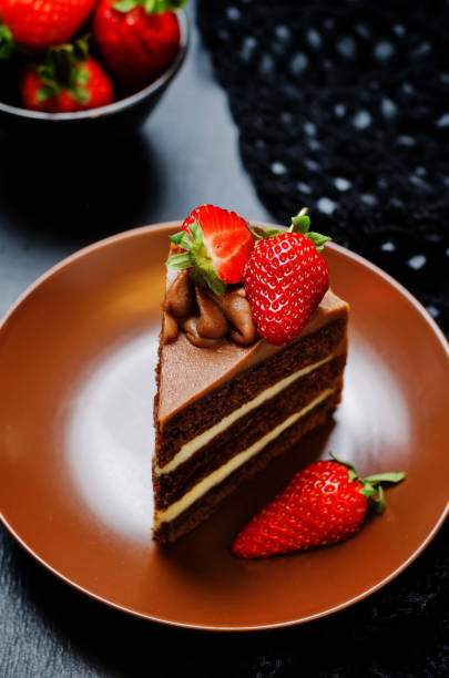 istock Chocolate cake decorated with strawberries 668909500