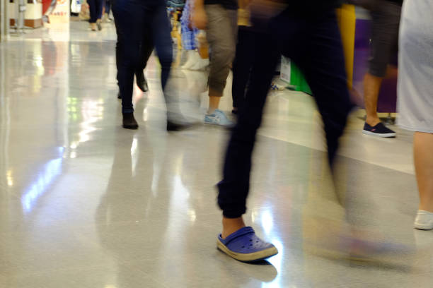 istock People walking in the street, blurry 668912224