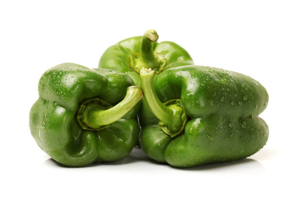 istock Green bell pepper on the white background 668920618