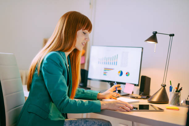 istock Businesswoman using modern comunication tools in business 668930812