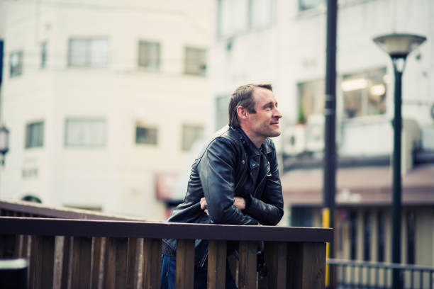Photo of a man walking the cobblestone streets and discovering sights of a new city in Europe