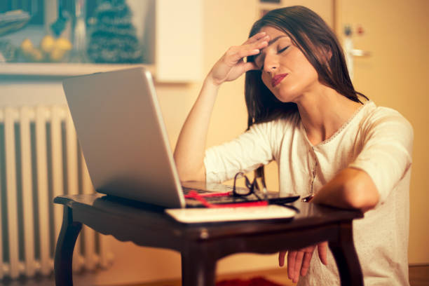istock Woman working on laptop at home 668951786