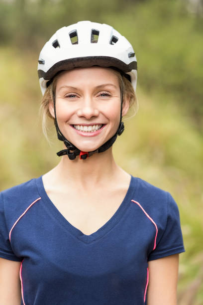istock Young pretty happy biker looking at camera 668954636