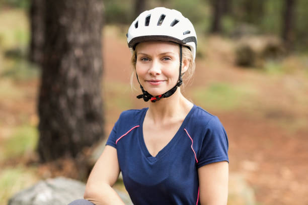 istock Young pretty happy biker looking at camera 668954758