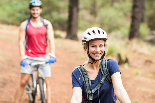 istock Happy young biker couple looking at camera 668955406