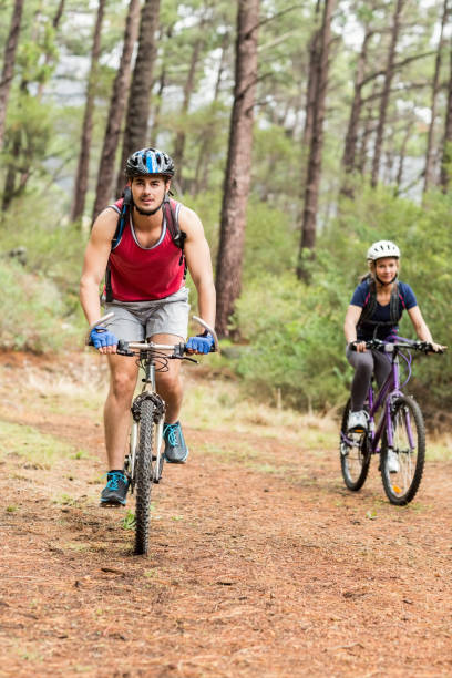 istock Pretty biker couple biking 668964992
