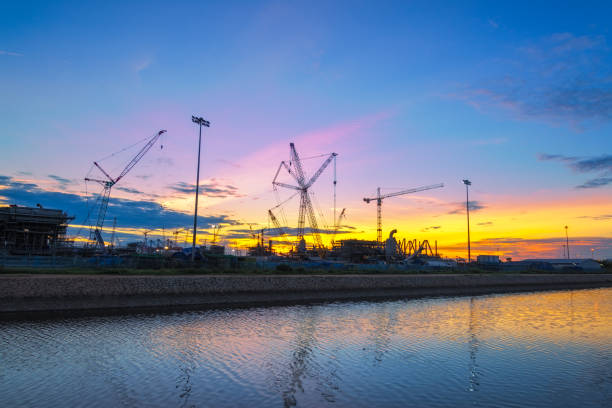 istock silhouettes of construction site 668965266