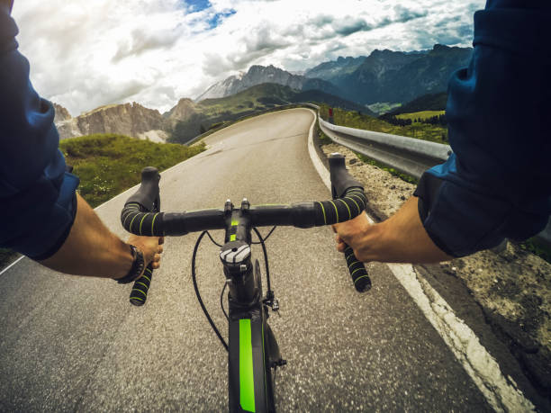 istock POV riding a road racing bicycle on mountain pass 668968754