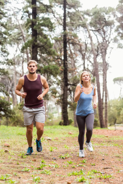 istock Young happy joggers running 668969036