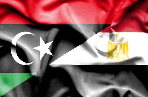 ilustraciones, imágenes clip art, dibujos animados e iconos de stock de ondeando la bandera de egipto y libia - libyan flag