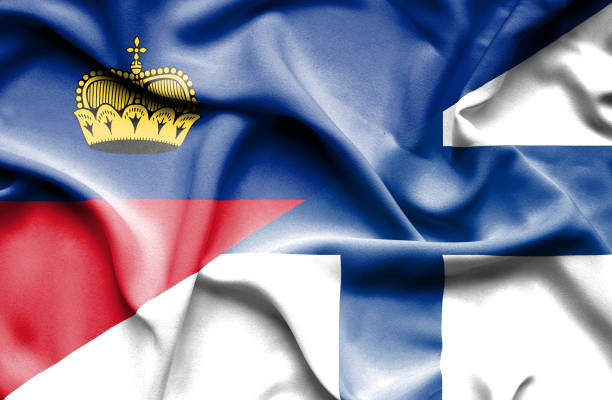 istock Waving flag of Finland and Lichtenstein 668973468