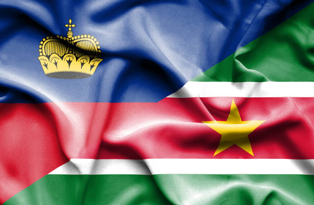 istock Waving flag of Suriname and Lichtenstein 668973726