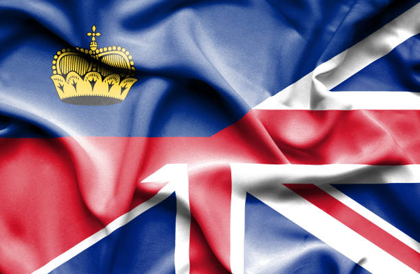 istock Waving flag of United Kingdon and Lichtenstein 668973770